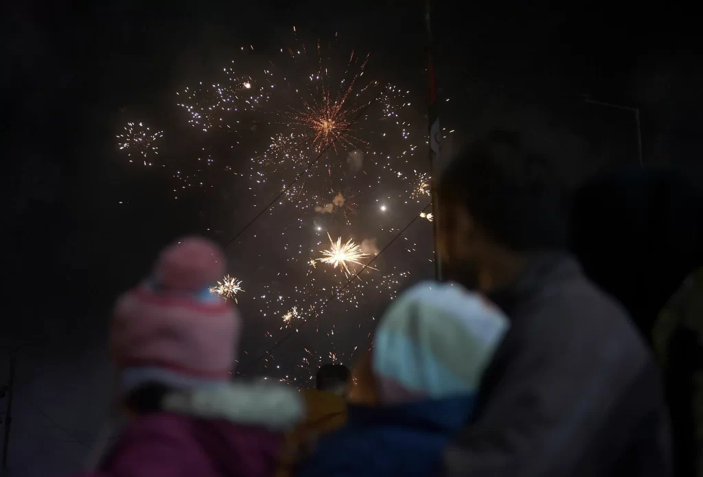 People watch a fireworks show in Karachi.
Rizwan Tabassum /AFP via Getty Images