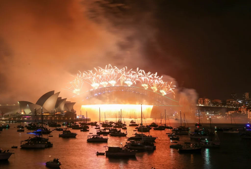 Fireworks can be seen over the Sydney Harbour Bridge in Sydney, Australia.
Roni Bintang/Getty Images