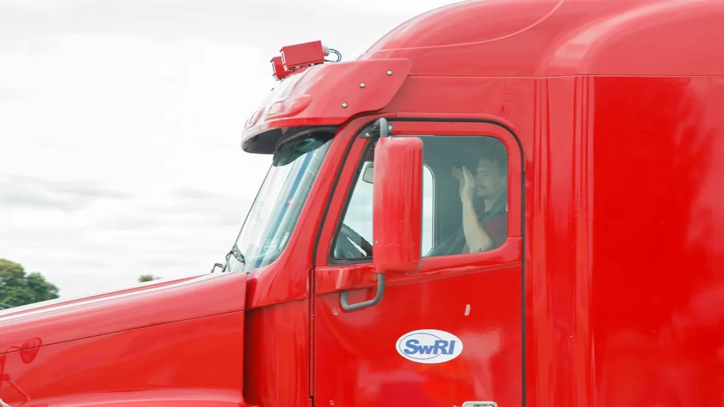 Look, no hands! Will self-driving trucks such as these make humans redundant, or just change our skill set? (Credit: Science Photo Library)

