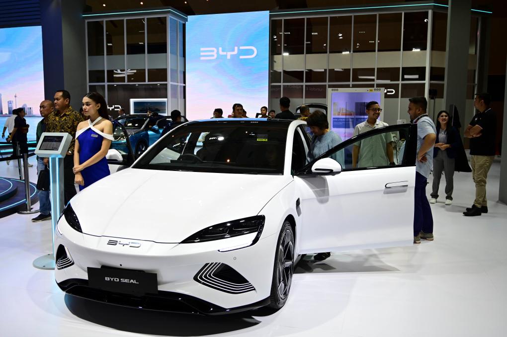 This photo taken on Feb. 15, 2024 shows a scene at the booth of Chinese automaker BYD during the Indonesia International Motor Show 2024 at Jakarta International Expo in Jakarta, Indonesia. (Photo/Xinhua)
