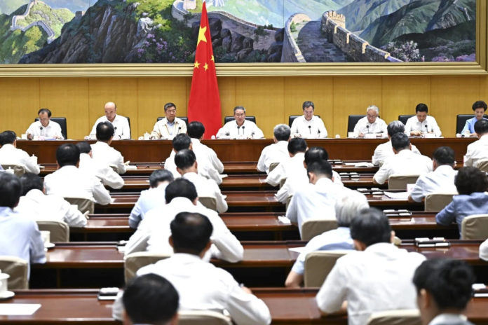 Chinese Premier Li Qiang presides over the fifth plenary meeting of the State Council Friday. Photo: Xinhua