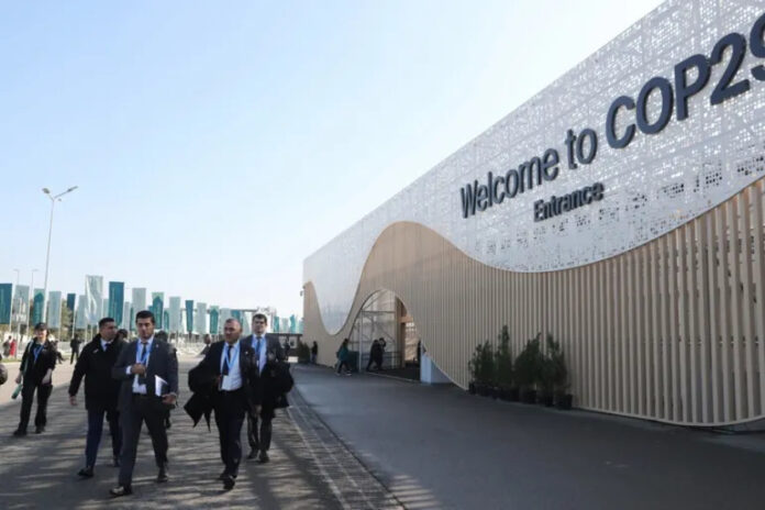 Participants arrive to attend the UN Climate Change Conference COP29 in Baku, Azerbaijan [Igor Kovalenko/EPA]